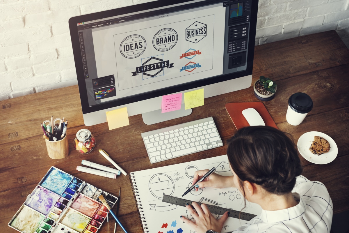 Designer making digital logos